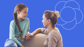A mom and her tween daughter having a meaningful, engaged conversation on a sofa, symbolizing how open family communication fosters gratitude and a growth mindset.