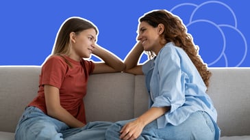 Parent and child having an open emotional conversation at home