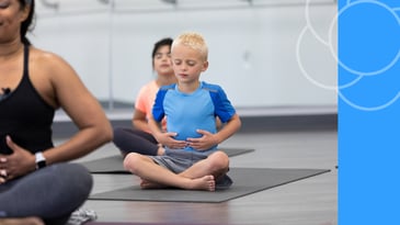 Middle schooler taking a calming breath to manage stress.